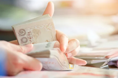 Baht opens weaker at 33.45 per dollar as oil and the dollar rise