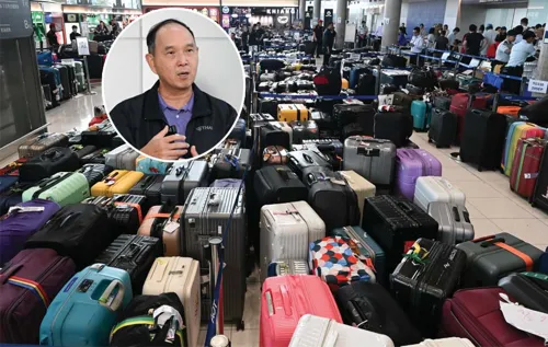Thai Airways cuts 30-40% of flights after Bangkok floods leave ground staff short