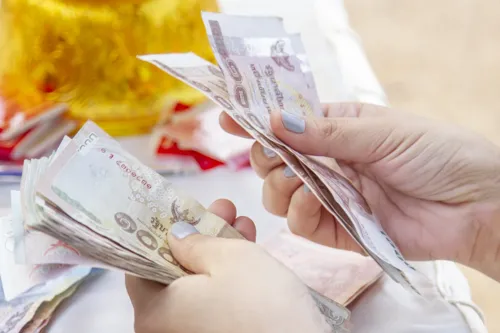 Baht opens weaker at 33.15 per dollar as Fed rate-hike odds jump, so review import costs and dollar pricing this week
