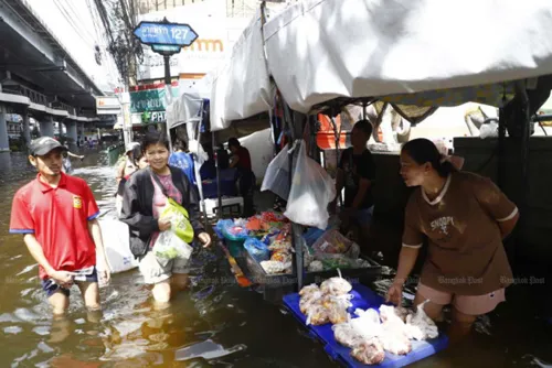 Flood-hit Thai traders face price checks and egg export curbs this month